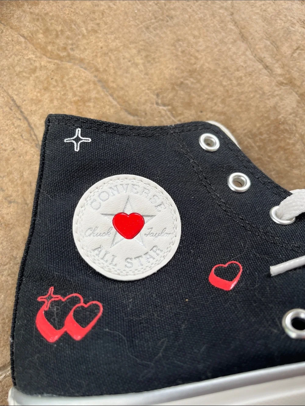 Converse Kids Black High-Top Sneakers with White Soles and Red Heart Details